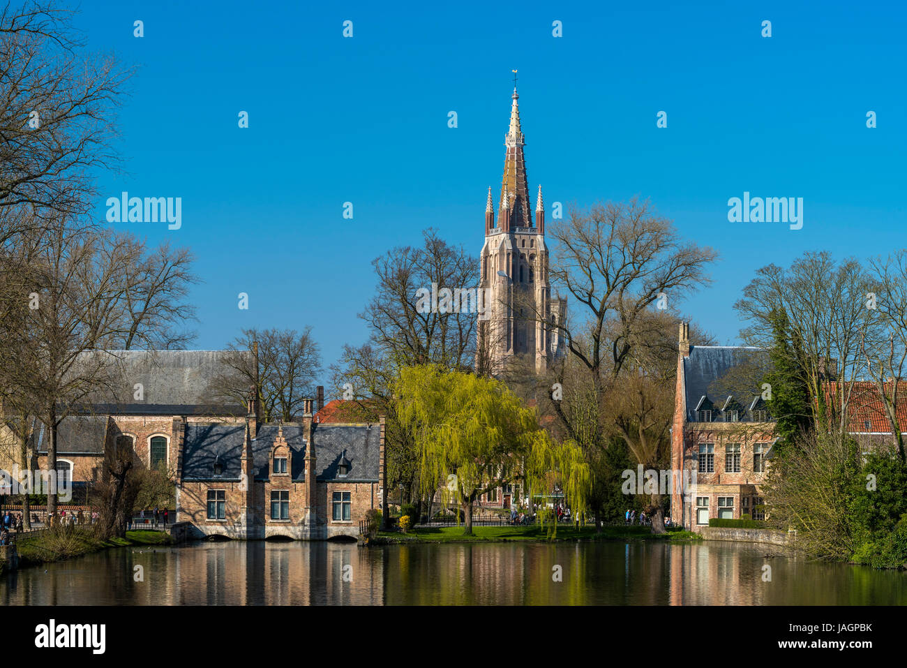 Picturesque view of the old town with belfry of Church of Our Lady in Bruges in the background, Bruges, West Flanders, Belgium Stock Photo