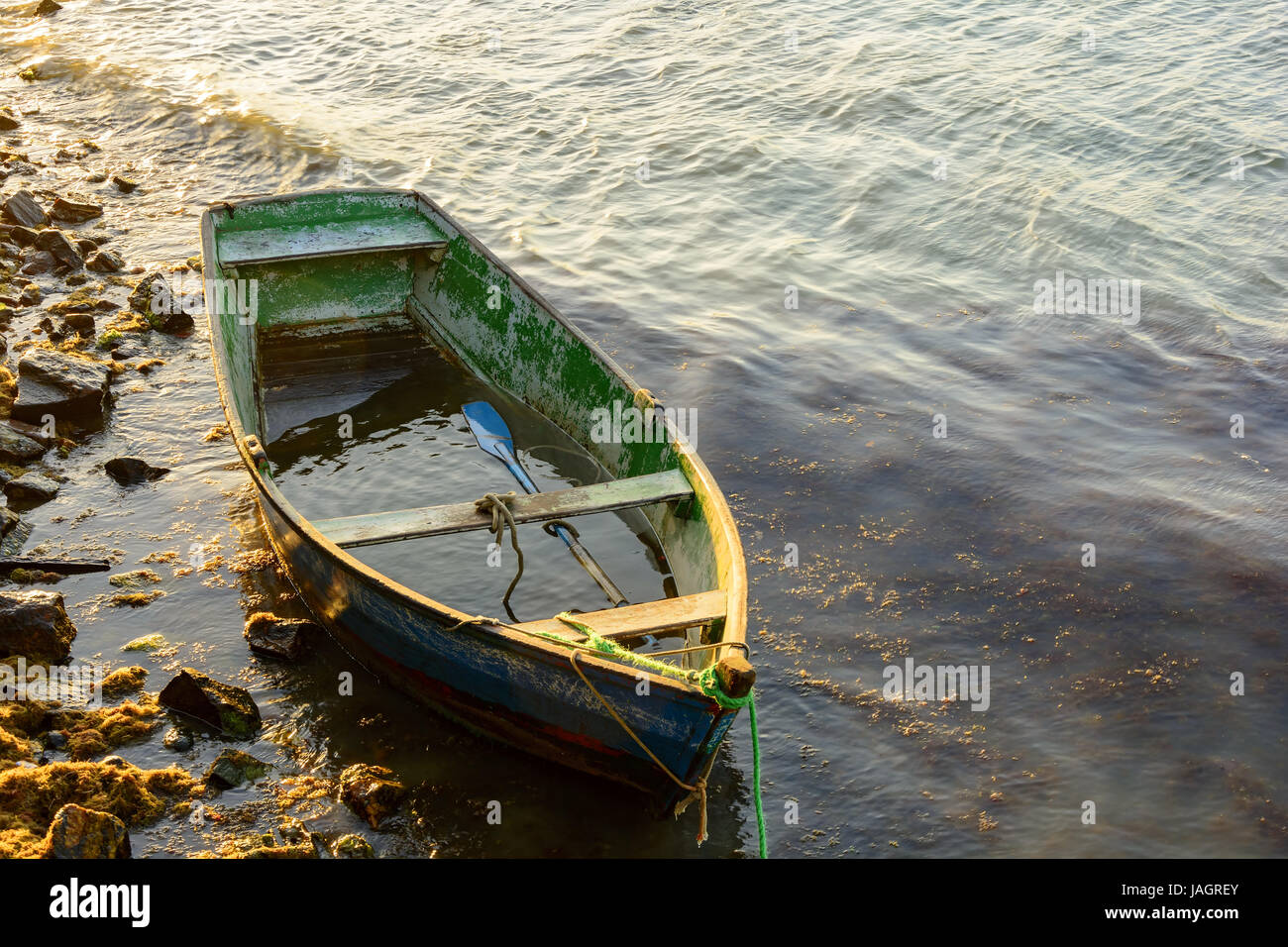 Old fishing boat and wood in the waters of Buzios sea Stock Photo - Alamy