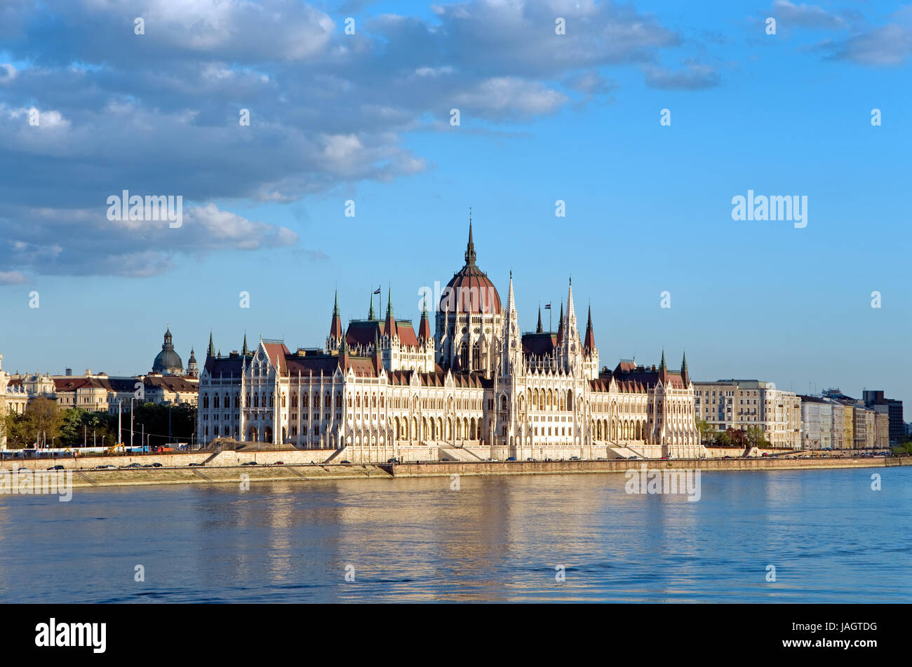parliament of budapest and river danube at sunset Stock Photo