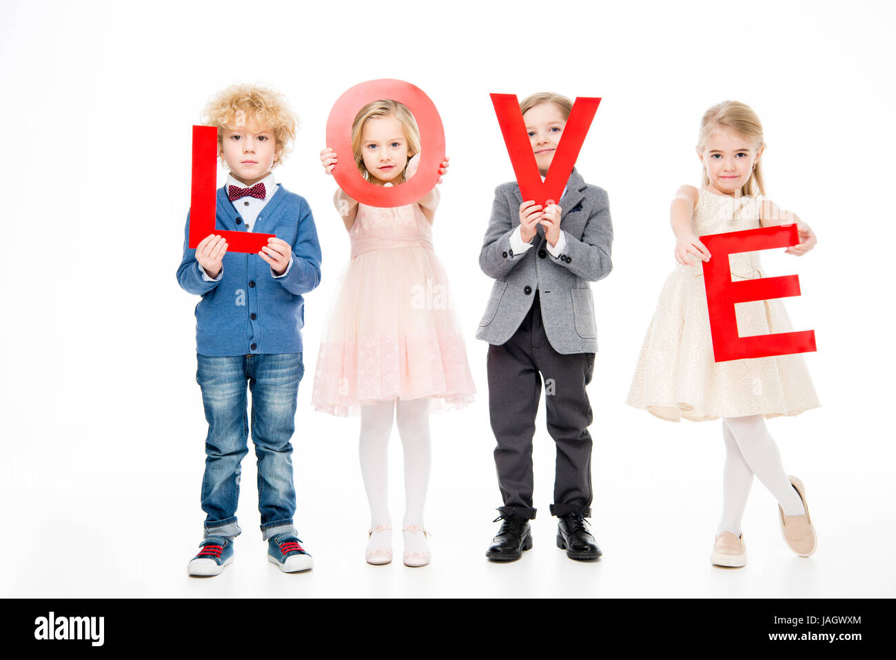 Kids holding word love Stock Photo - Alamy