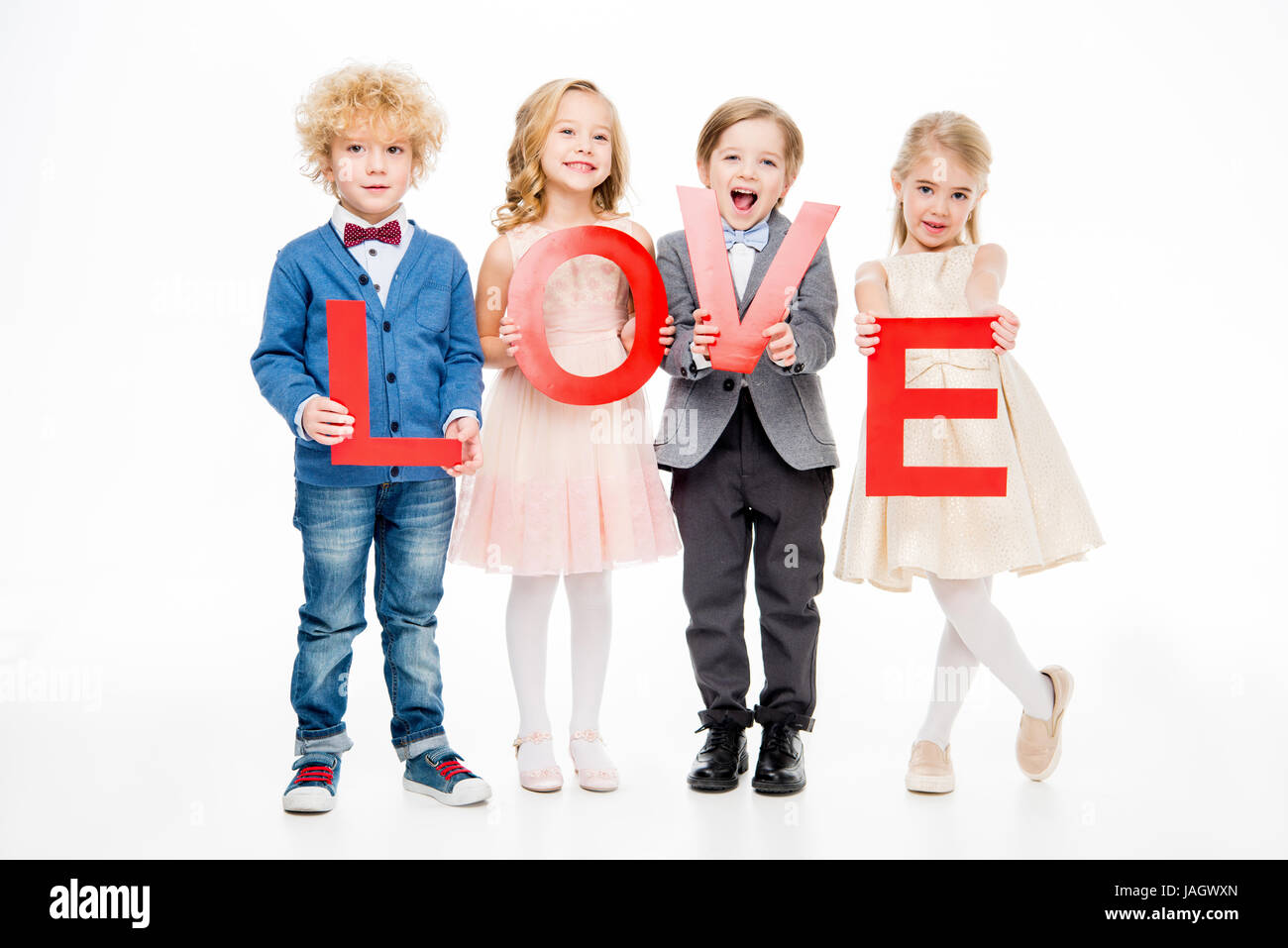 Kids holding word love Stock Photo - Alamy