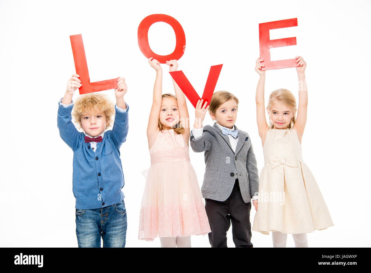 Kids holding word love Stock Photo - Alamy