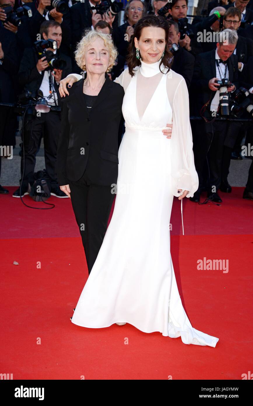 Claire Denis and Juliette Binoche (dress designed by Chloé and jewels by Chopard)  Arriving on the red carpet for the film 'Okja'  70th Cannes Film Festival  May 19, 2017 Photo Jacky Godard Stock Photo