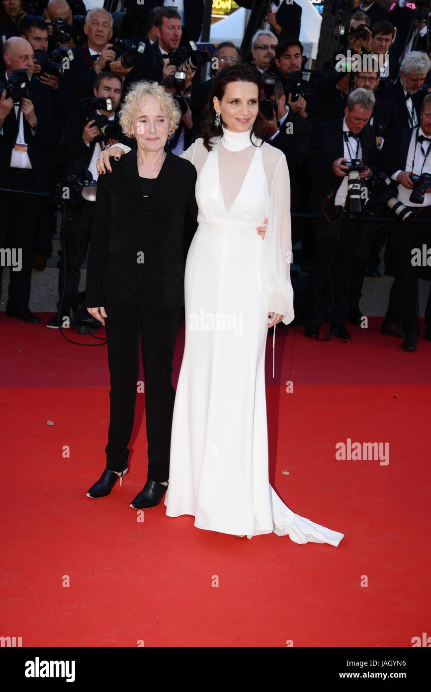 Claire Denis and Juliette Binoche (dress designed by Chloé and jewels by Chopard)  Arriving on the red carpet for the film 'Okja'  70th Cannes Film Festival  May 19, 2017 Photo Jacky Godard Stock Photo