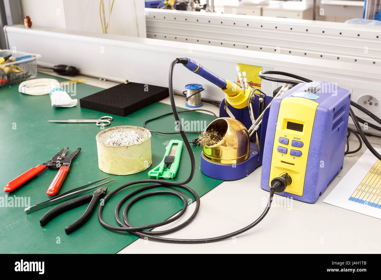 electronics equipment assembly workplace with solder and necessary