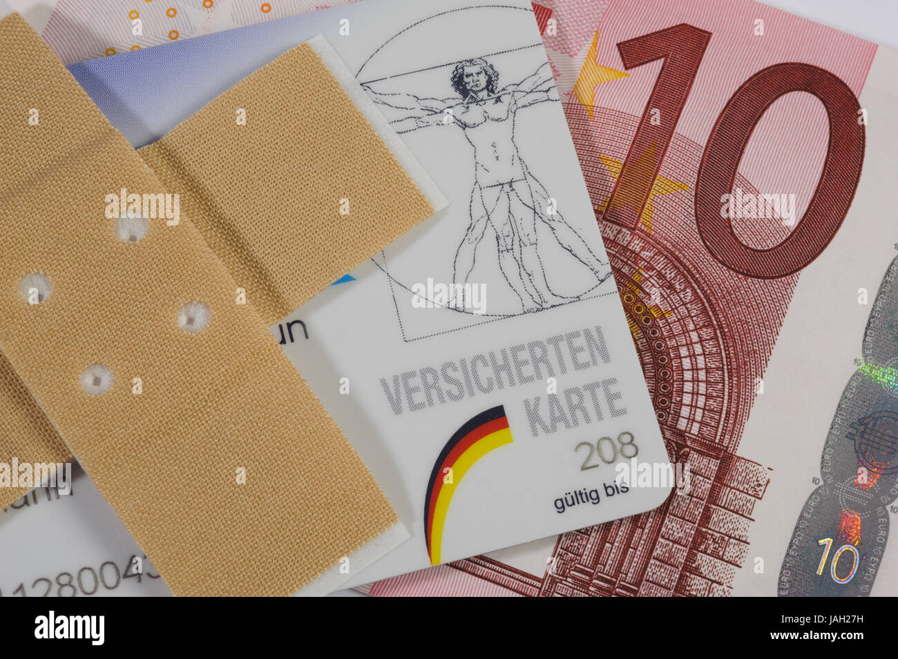 Insured person's card of the health insurance,bank note,plasters Stock ...