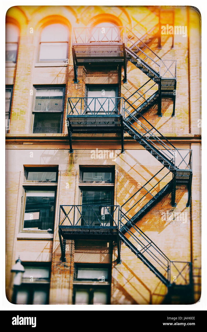 Fire escape stairs outside of building vintage look Stock Photo