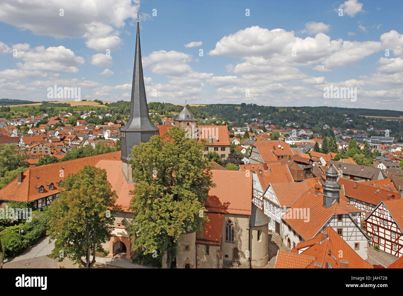 Germany,Hessen,Northern Hessen,slot,town overview,Northern Hessen,Old Town,church,town church,steeple,trees,houses,buildings, Stock Photo