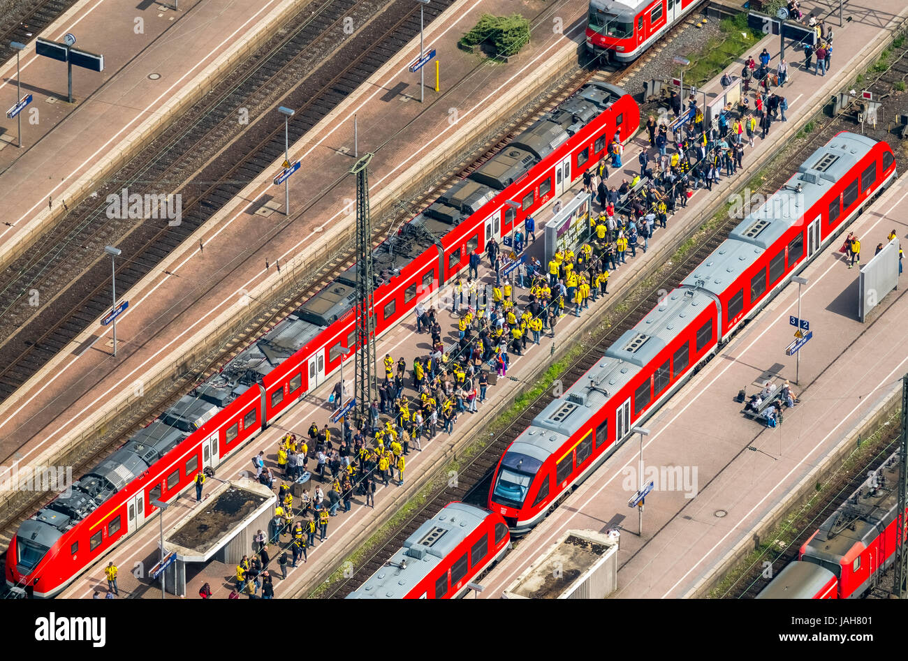 Urban railway, platform with BVB fans, Dortmund, Ruhr area, North Rhine-Westphalia, Germany Stock Photo
