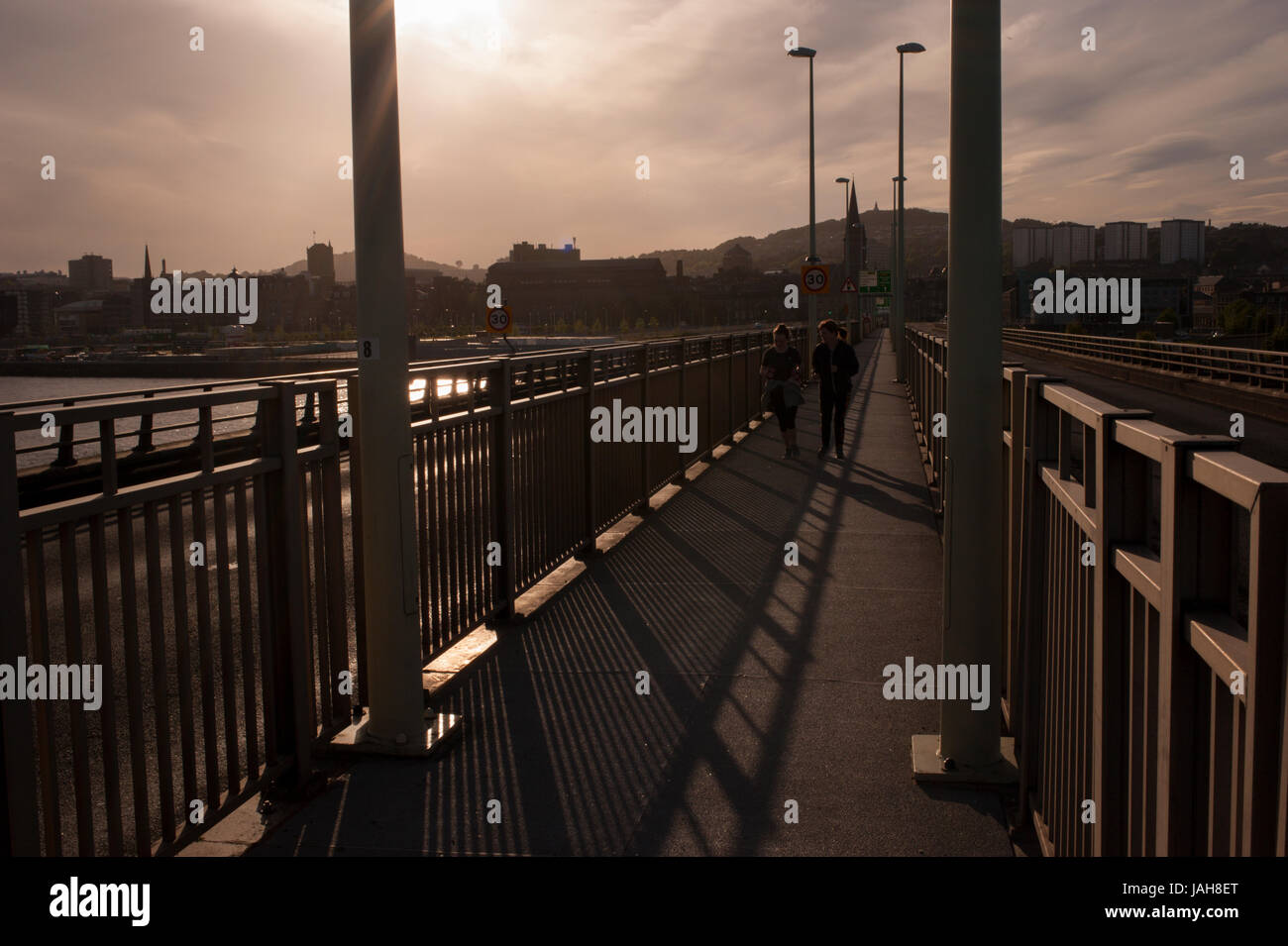 People running on the Road Tay Bridge. Dundee, Scotland. Situated on the north bank of Firth of Tay Dundee is the fourth-largest city in Scotland , an Stock Photo