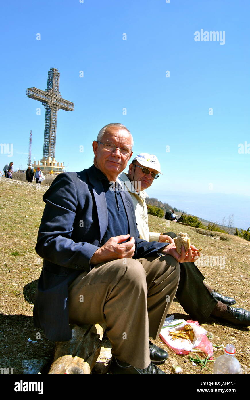 Old men having a picnic at the Millenium Cross, Skopje, Macedonia Stock Photo