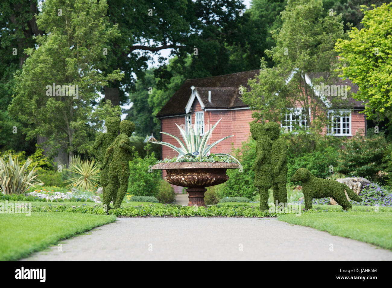 Enid Blyton's Famous Five hedge sculptures at RHS Wisley Gardens, Surrey, England Stock Photo