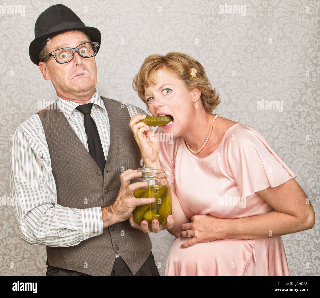 Craving pregnant woman eating pickles from a jar Stock Photo Alamy