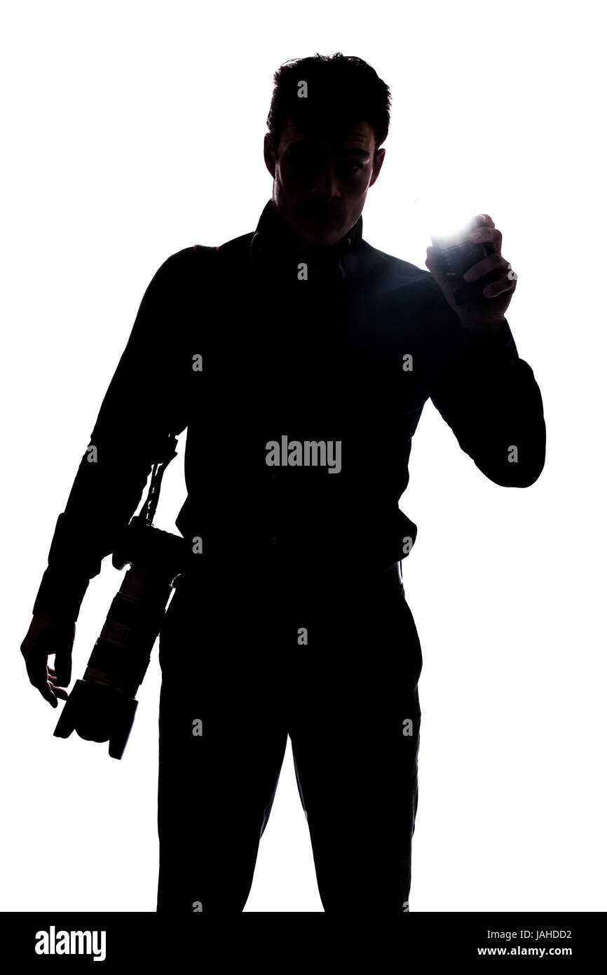 Photographer flashing at the camera in silhouette isolated over white ...