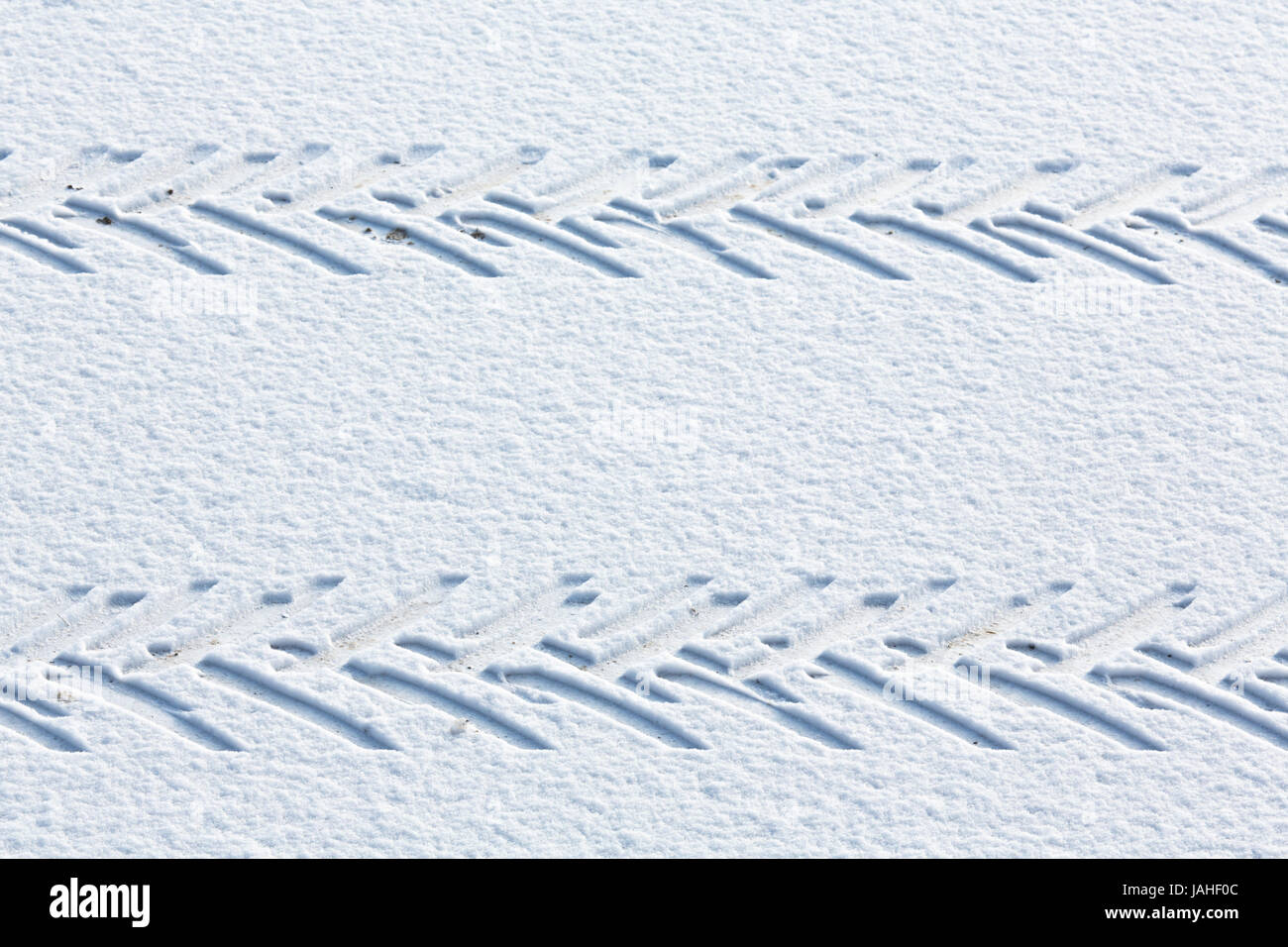 Reifenspuren im Schnee Stock Photo