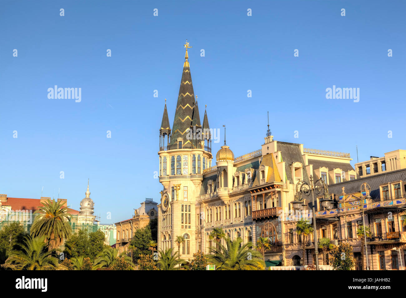 Building with an astronomical clock on the corner of Europe Square. Batumi. Georgia. Stock Photo