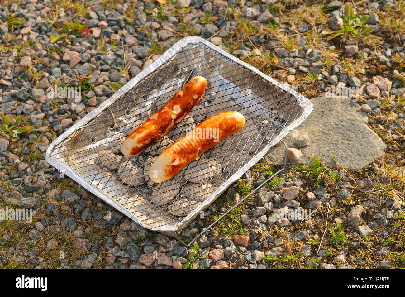 Disposable barbeque sausages hires stock photography and images Alamy