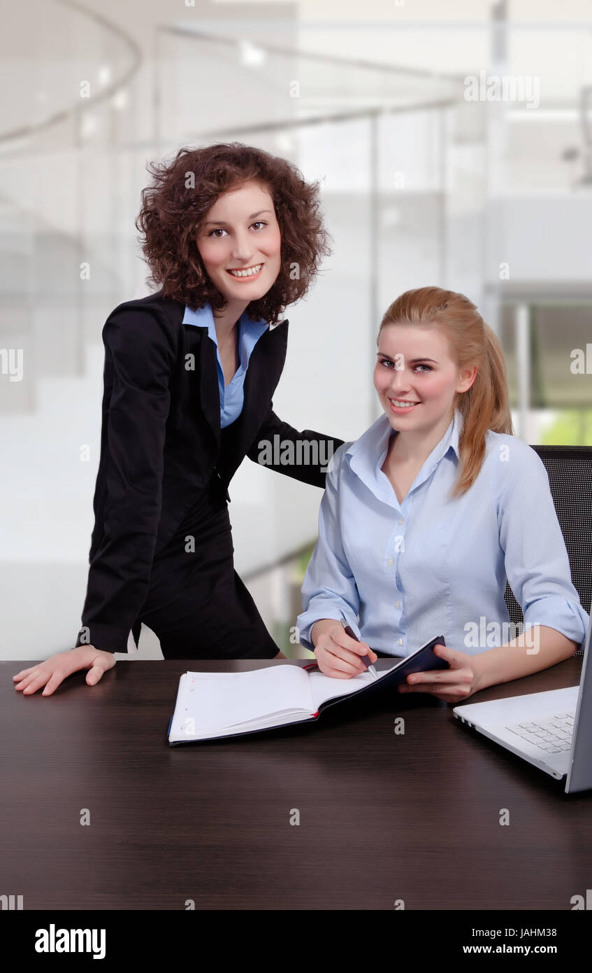 two business woman have a meeting in office Stock Photo - Alamy