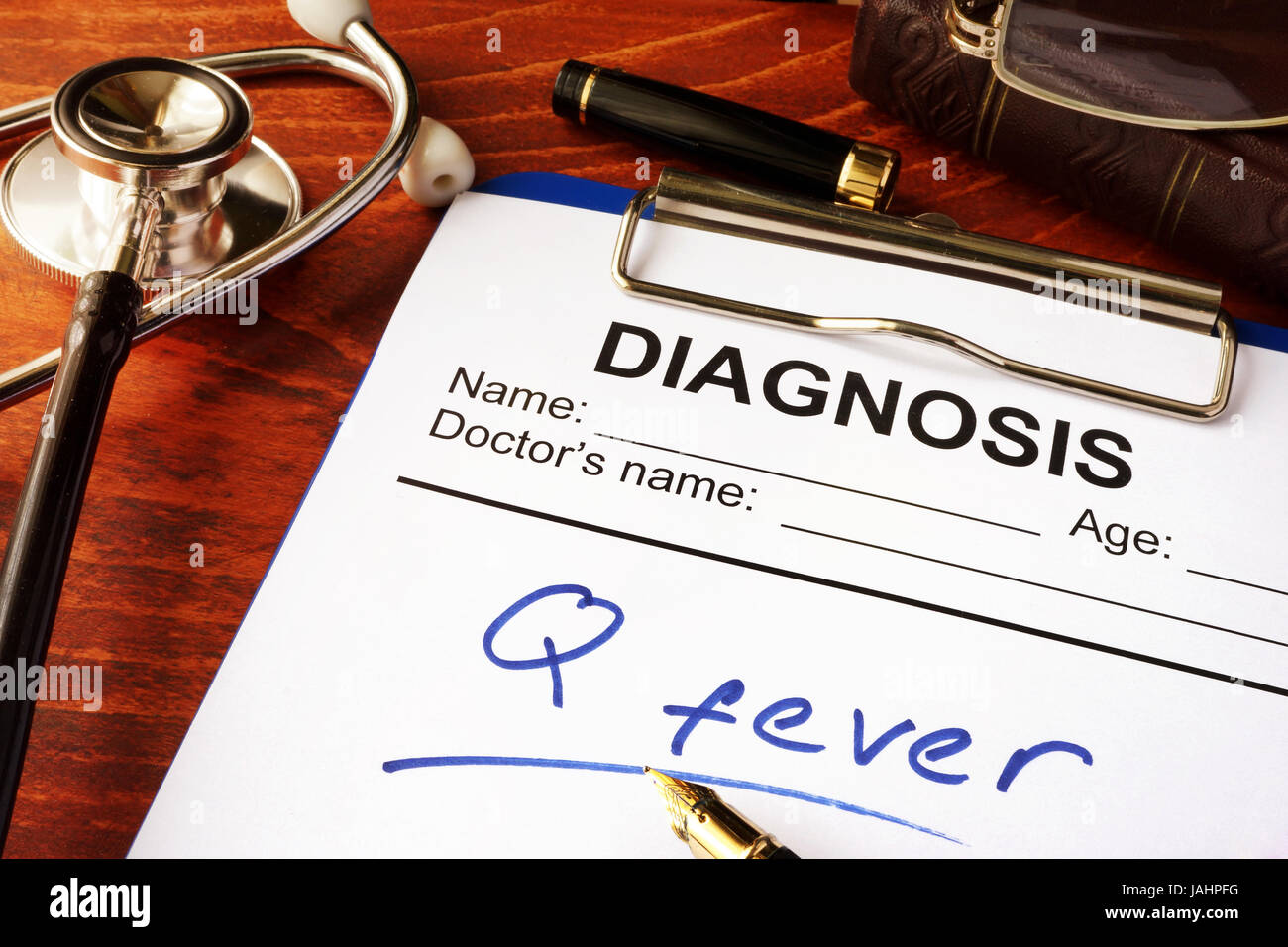 Medical form with diagnosis Q fever on a table Stock Photo Alamy