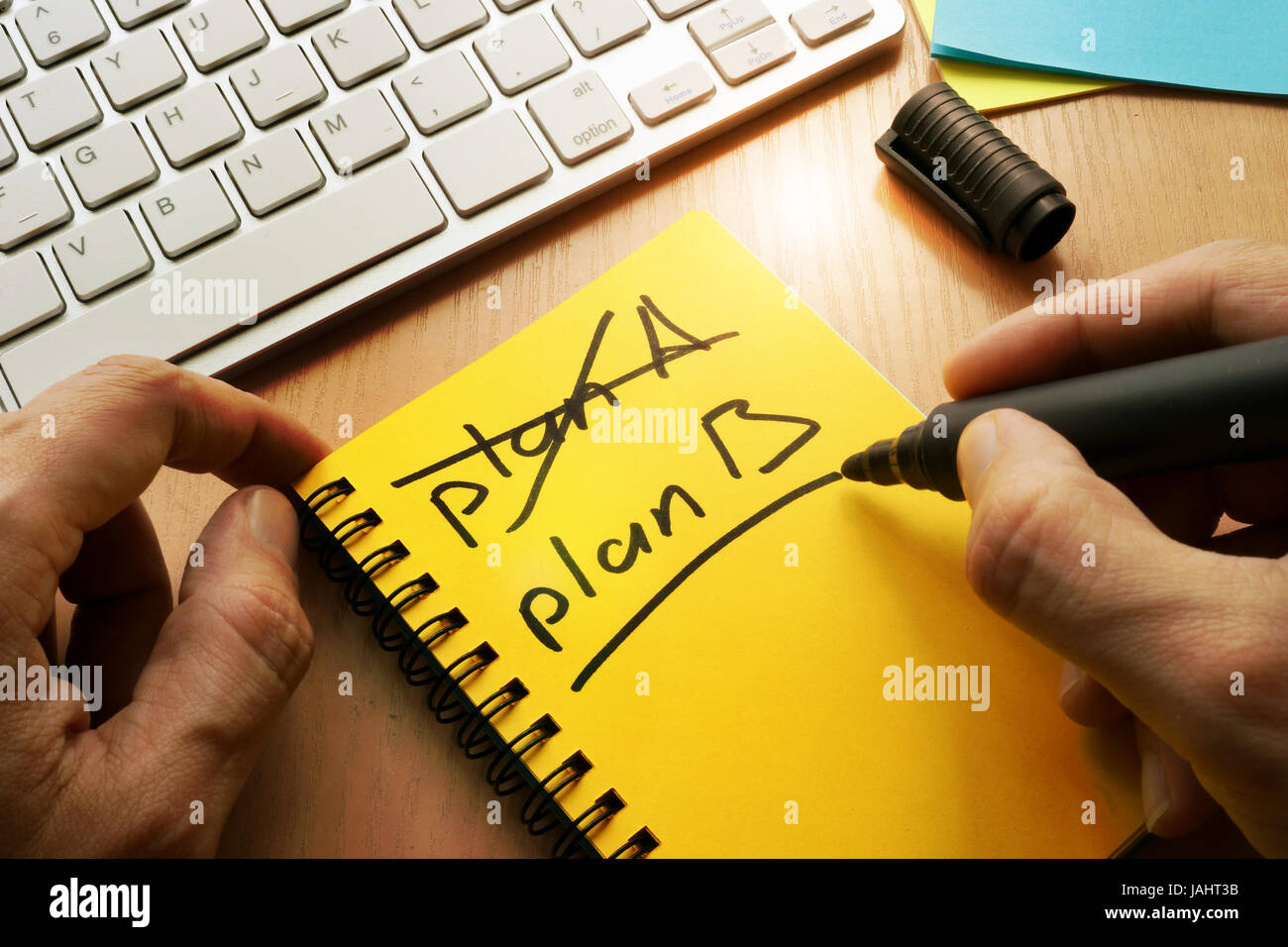 Plan A crossed, plan B written in a note. Stock Photo