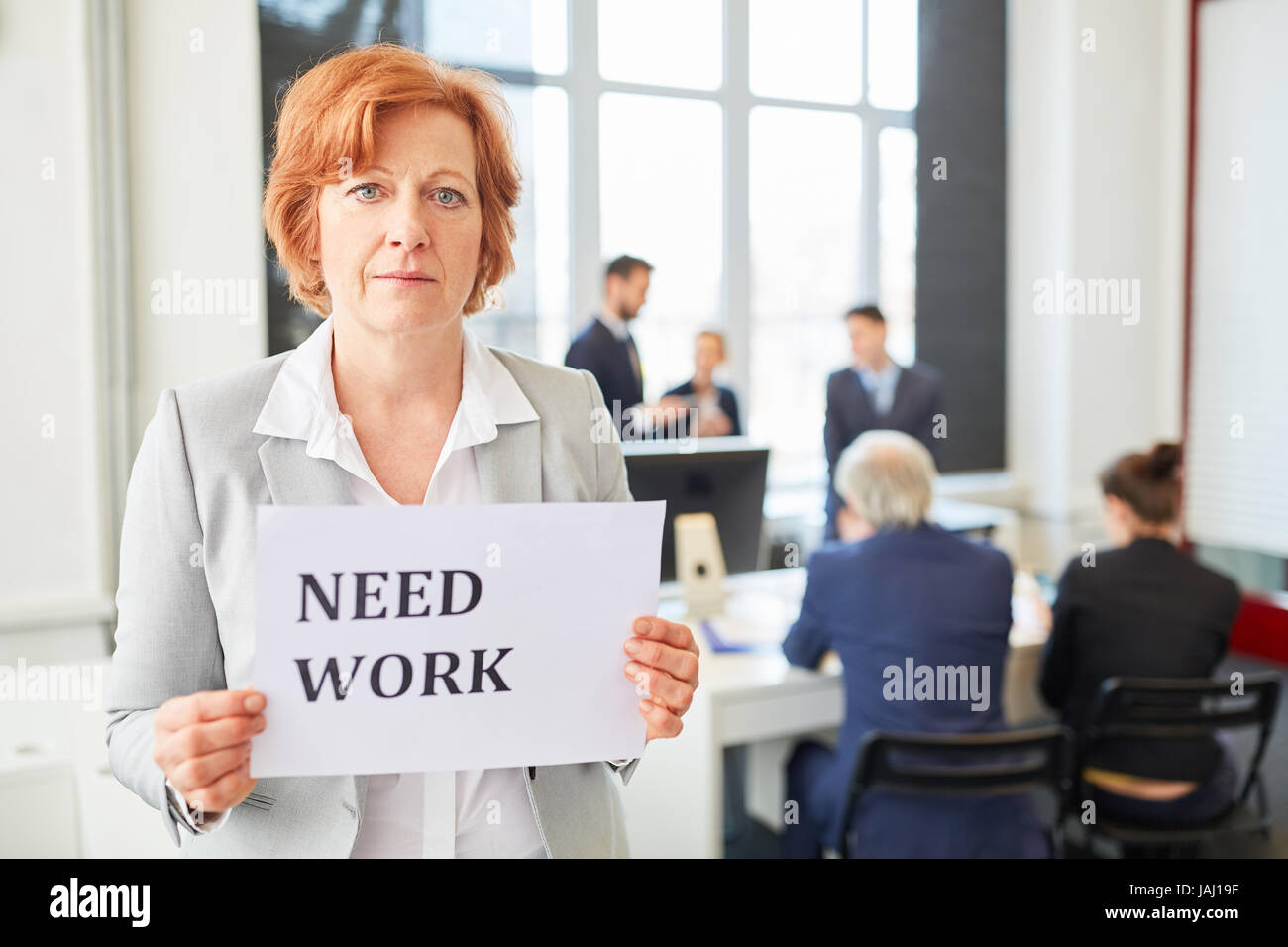 Senior business woman as unemployed candidate needs to find a job Stock Photo