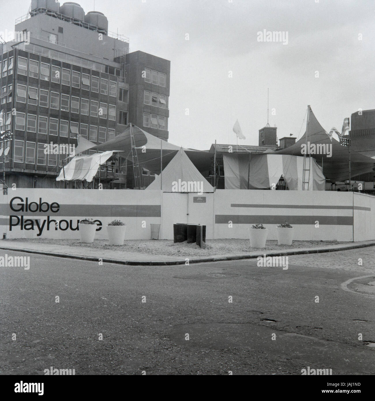 The site of the Globe Playhouse theatre in London in 1972. The Sam Wanamaker Playhouse is an indoor theatre forming part of Shakespeare's Globe, along with the Globe Theatre on Bankside, London. Built making use of 17th-century plans for an indoor theatre, the playhouse recalls the layout and style of the Blackfriars Theatre, although it is not an exact reconstruction. Its shell was built during the construction of the Shakespeare's Globe complex, notable for the reconstruction of the open-air Globe Theatre of the same period. The shell was used as a space for education workshops and rehearsal Stock Photo
