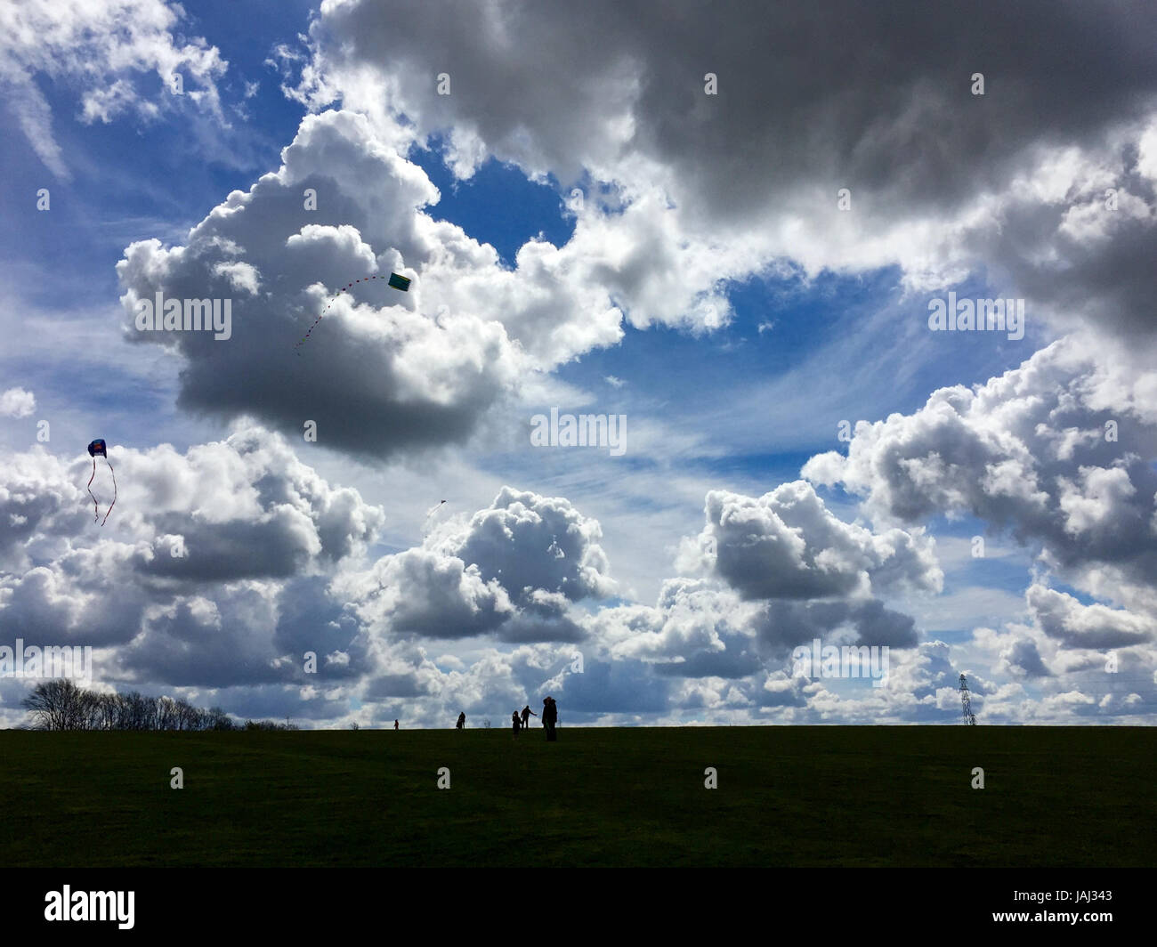 Kite flying on a sunny and cloudy day Stock Photo