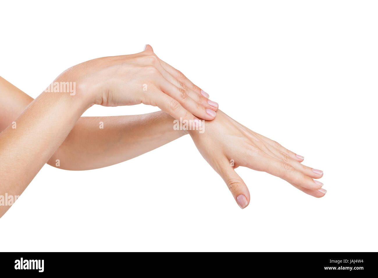 Woman applies cream on her hands isolated on white background Stock Photo