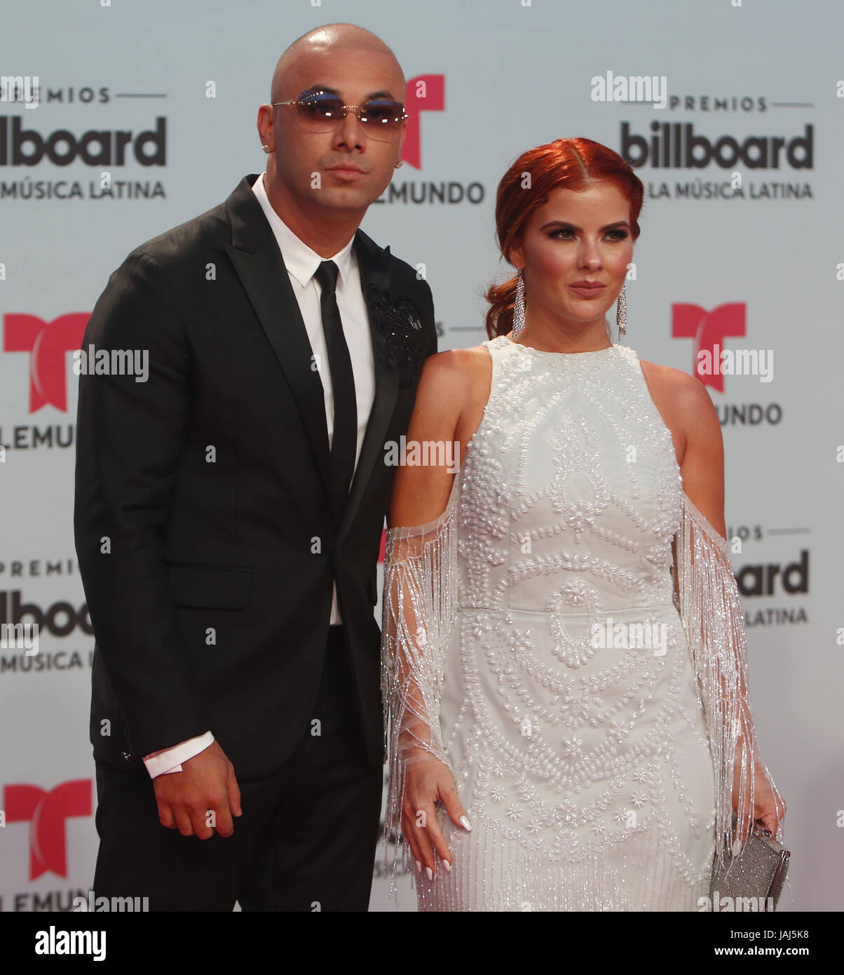 attends the Billboard Latin Music Awards at Watsco Center on April 27, 2017 in Miami, Florida.  Featuring: Wisin, Yomaira Ortiz Where: Coral Gables, Florida, United States When: 28 Apr 2017 Credit: JLN Photography/WENN.com Stock Photo