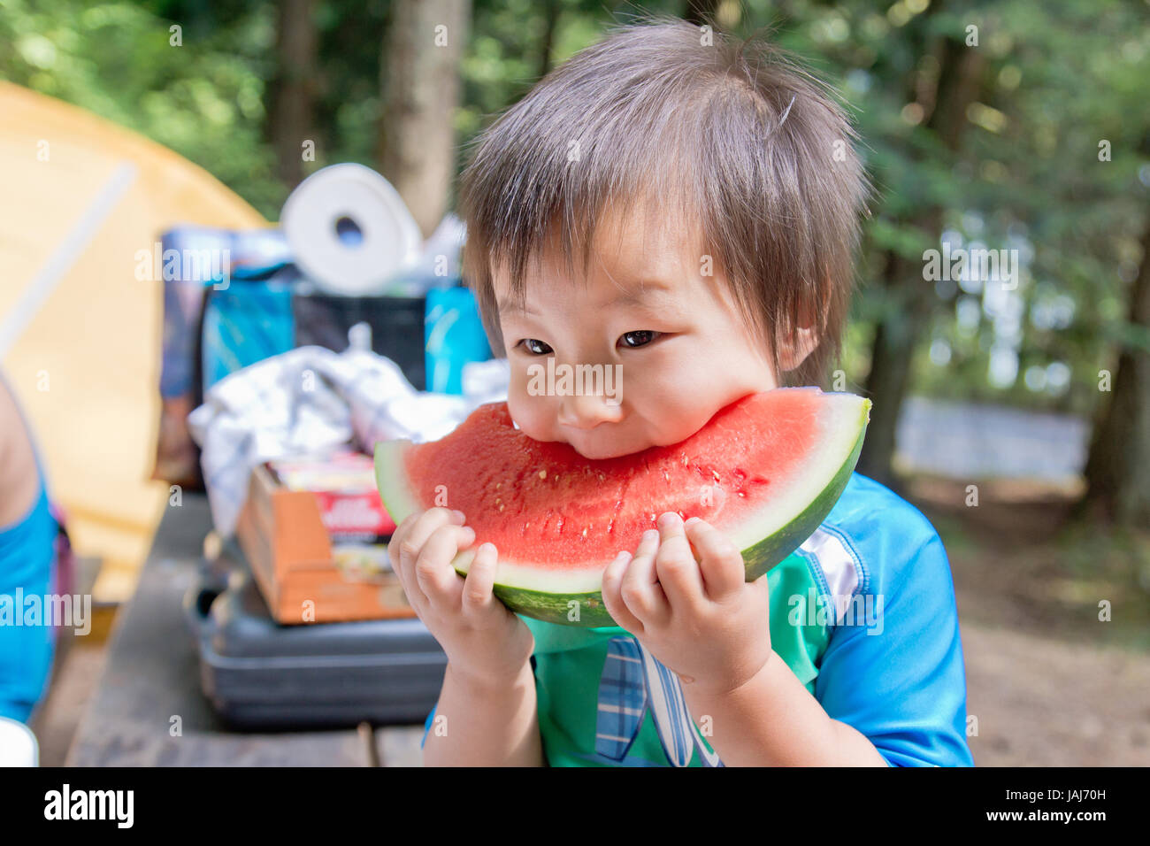 Boy Eating Watermelon Stock Photo