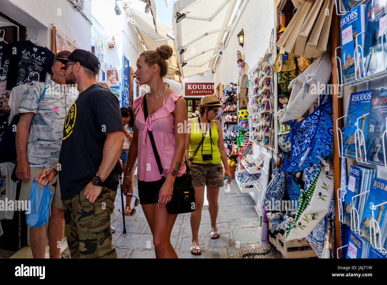 Tourists Shopping For Souvenirs In Lindos Village, Rhodes, Greece Stock