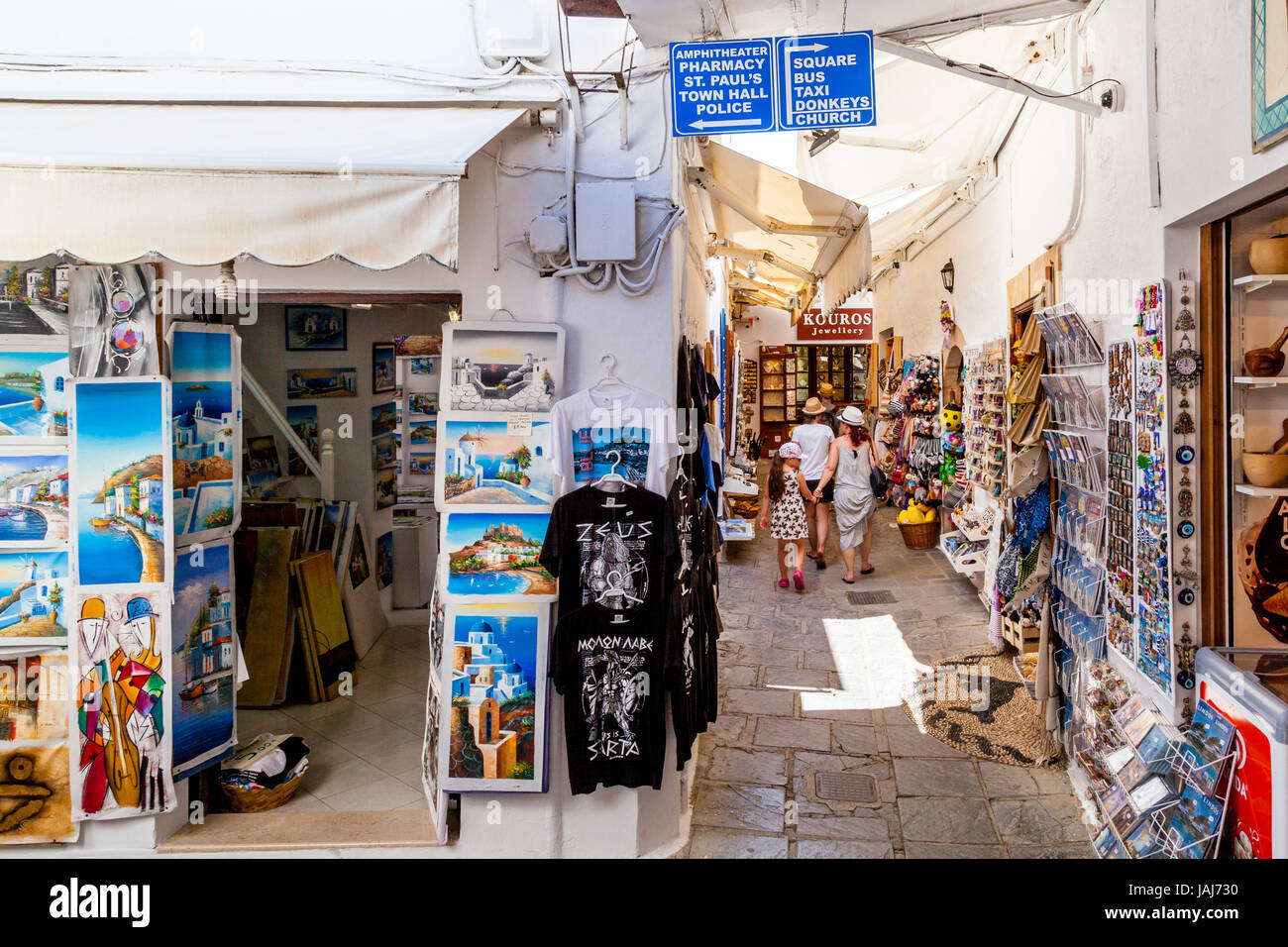 Tourists Shopping For Souvenirs In Lindos Town, Rhodes, Greece Stock
