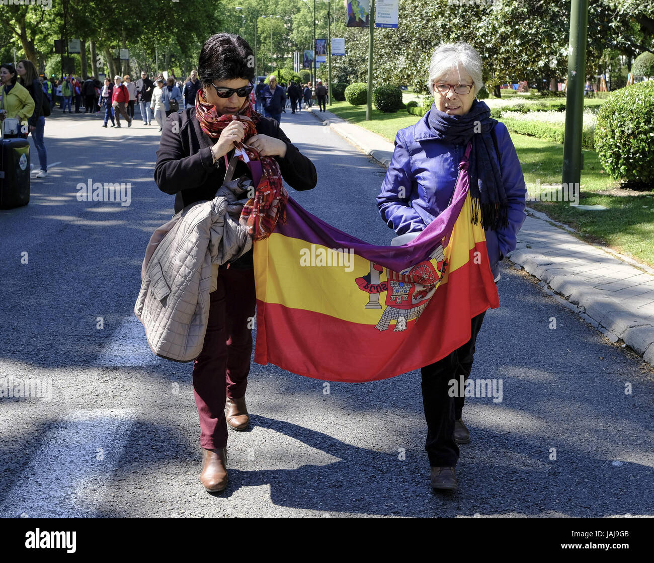 People take part in the Labour Day march held in downtown Madrid. Labor