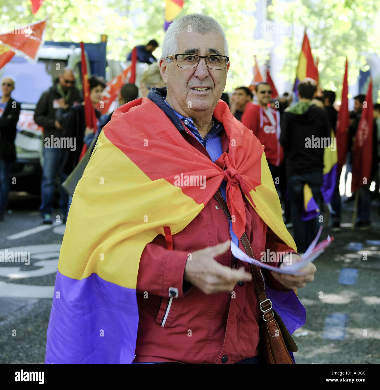 People take part in the Labour Day march held in downtown Madrid. Labor