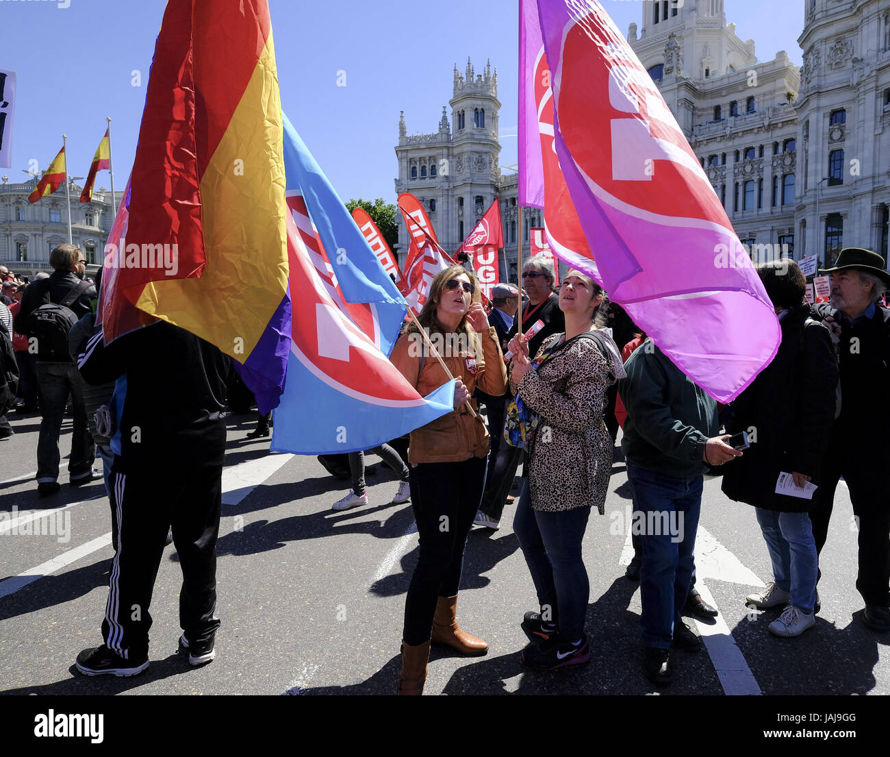People take part in the Labour Day march held in downtown Madrid. Labor