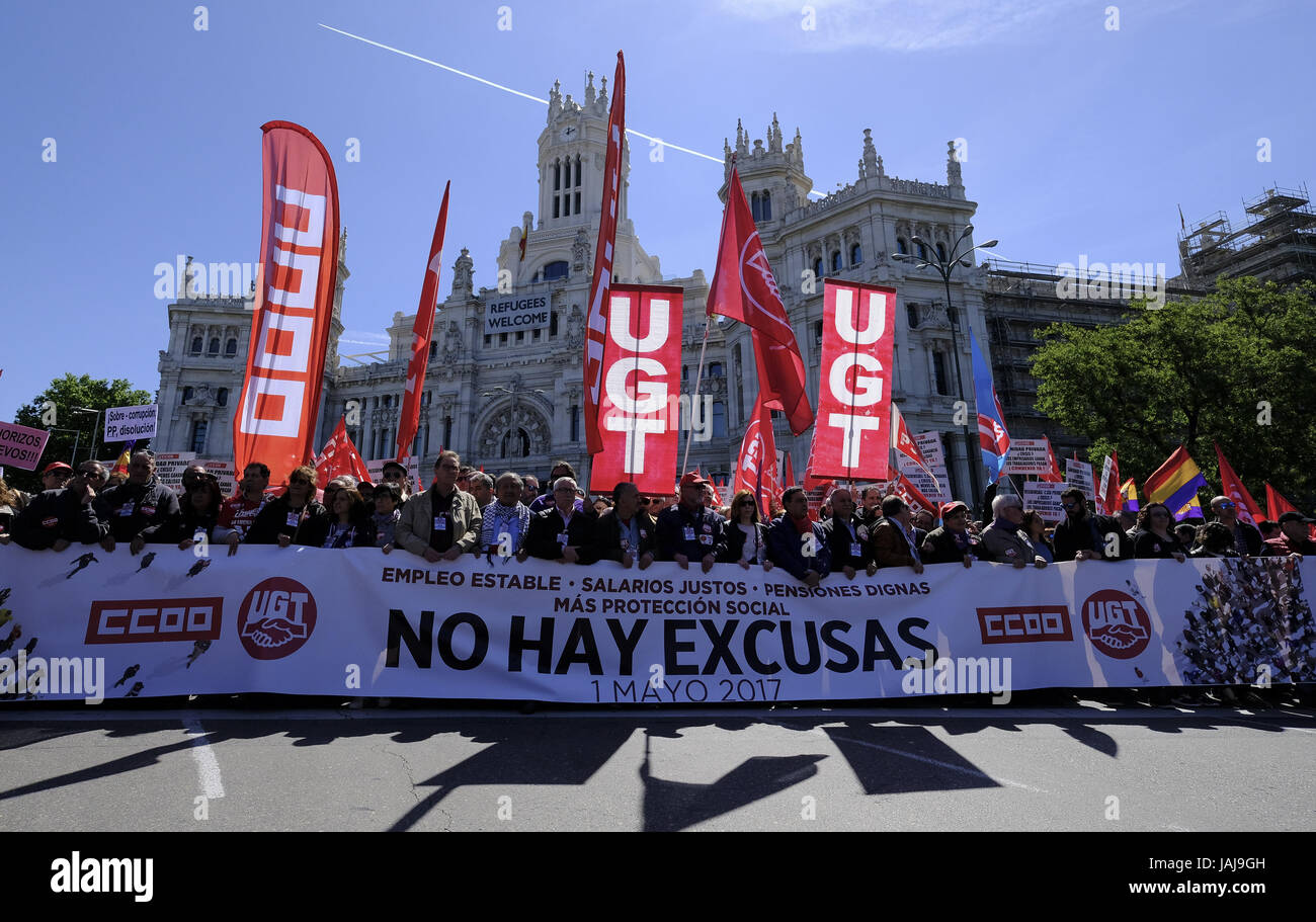 People take part in the Labour Day march held in downtown Madrid. Labor