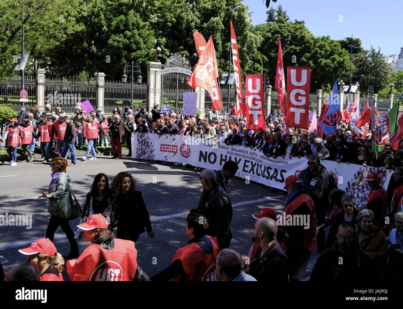 People take part in the Labour Day march held in downtown Madrid. Labor