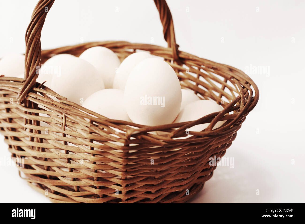 Eggs and Basket isolated on white Stock Photo Alamy