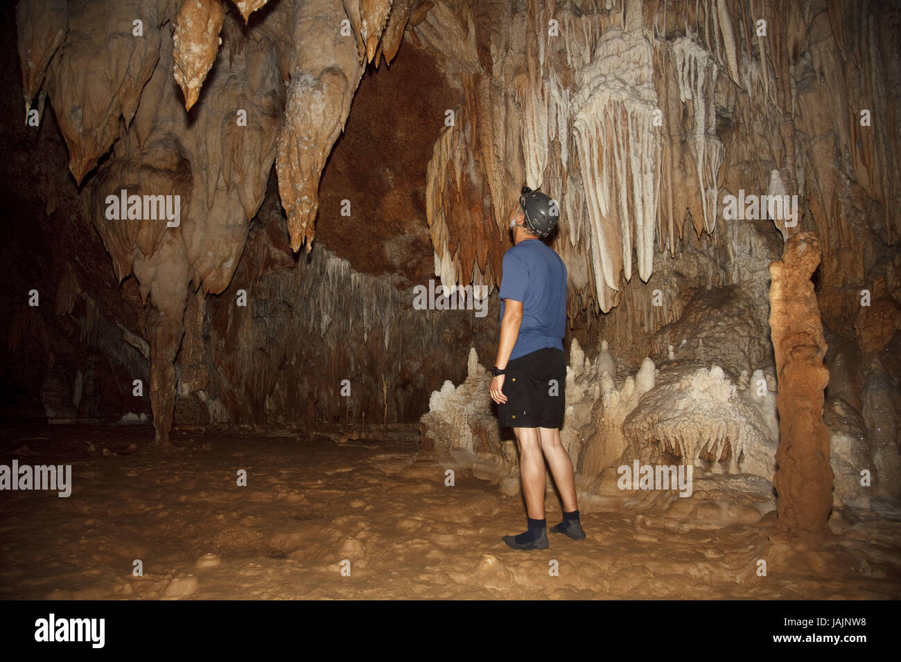 Belize,Actun Tunichil Muknal,pit,Maya,Xibalba,drip stone,stalagmite,to stalactites,tourist,model released,no property release, Stock Photo