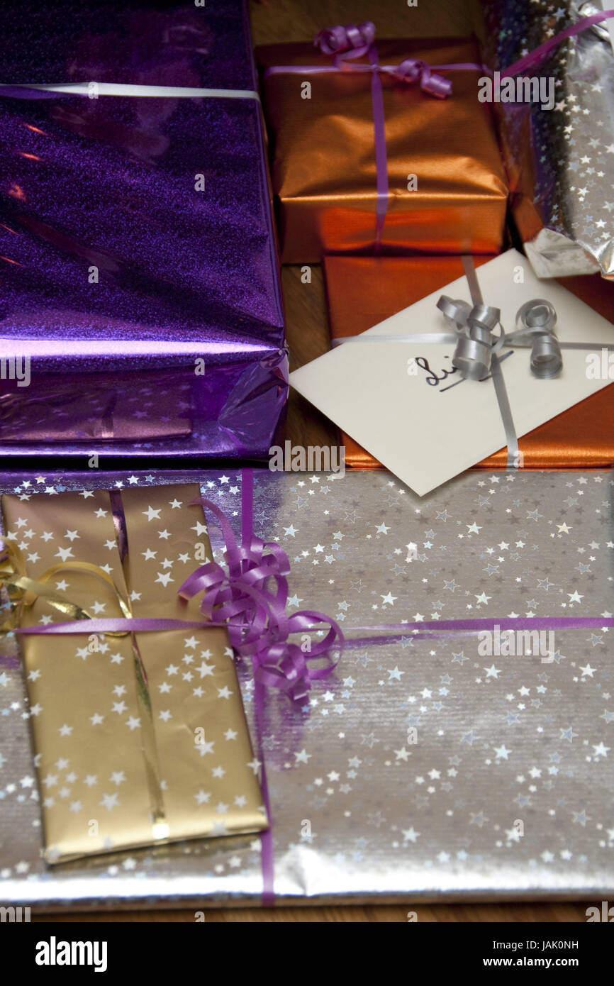 Presents,Christmas,give,envelope,gifts of money,joy,Christmas envelope,Christmas paper,envelope cords,envelope,stars,brightness,wrapping paper,Christmas packages,Christmas presents,packages,packages,brightly,medium close-up, Stock Photo