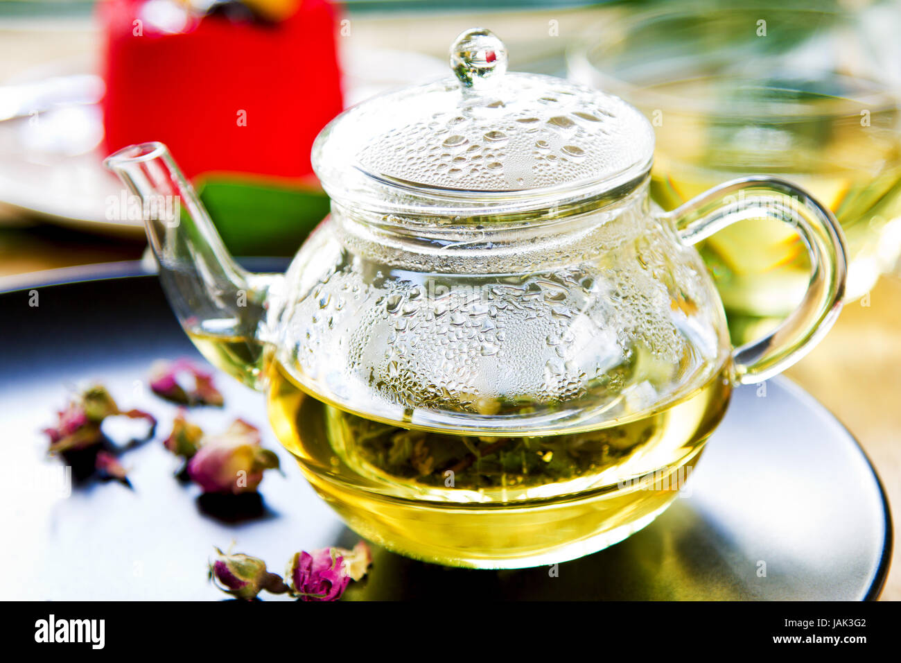 Verbena,Mint and Rose buds as mix herbal tea in a tea pot Stock Photo