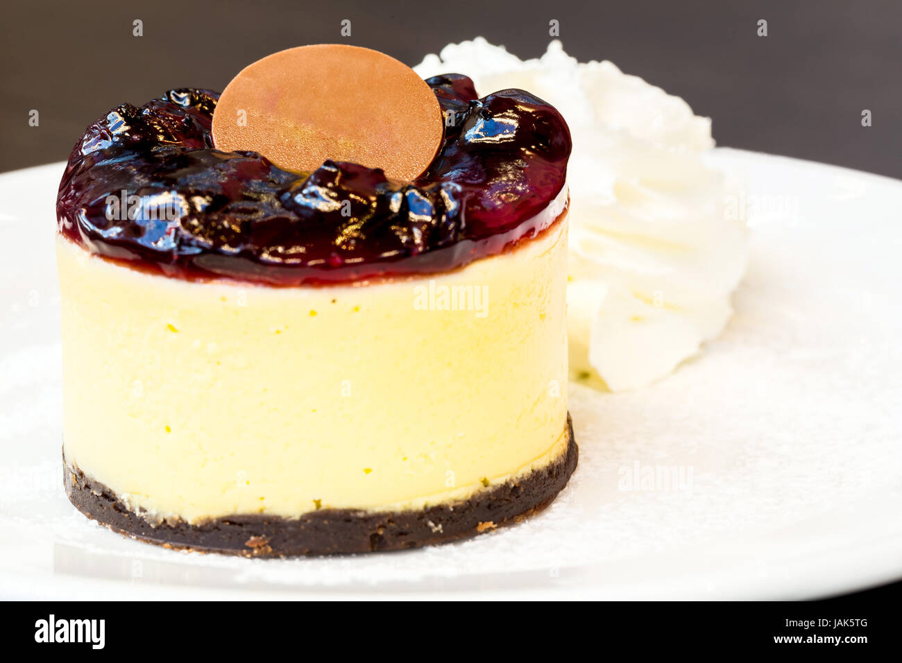 blueberry cheesecake with whipping cream Stock Photo Alamy