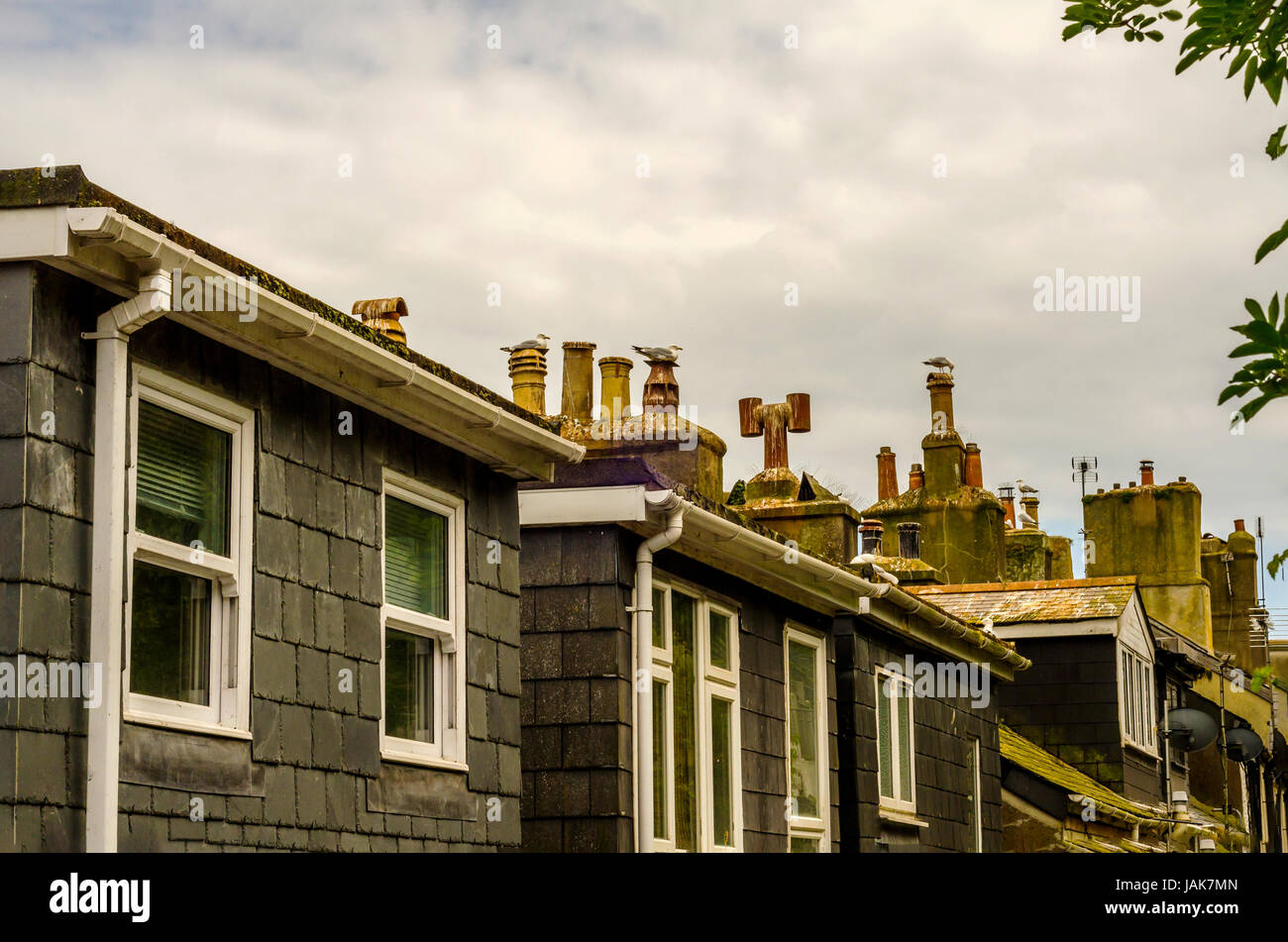 Typical English architecture, residential buildings in a row along the ...