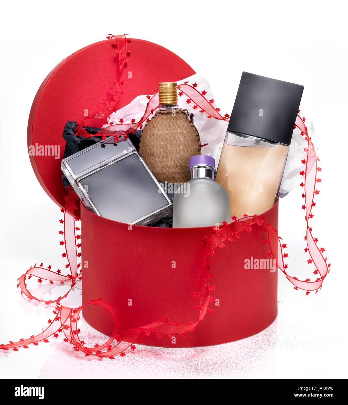 Perfumes in red festive box Stock Photo Alamy