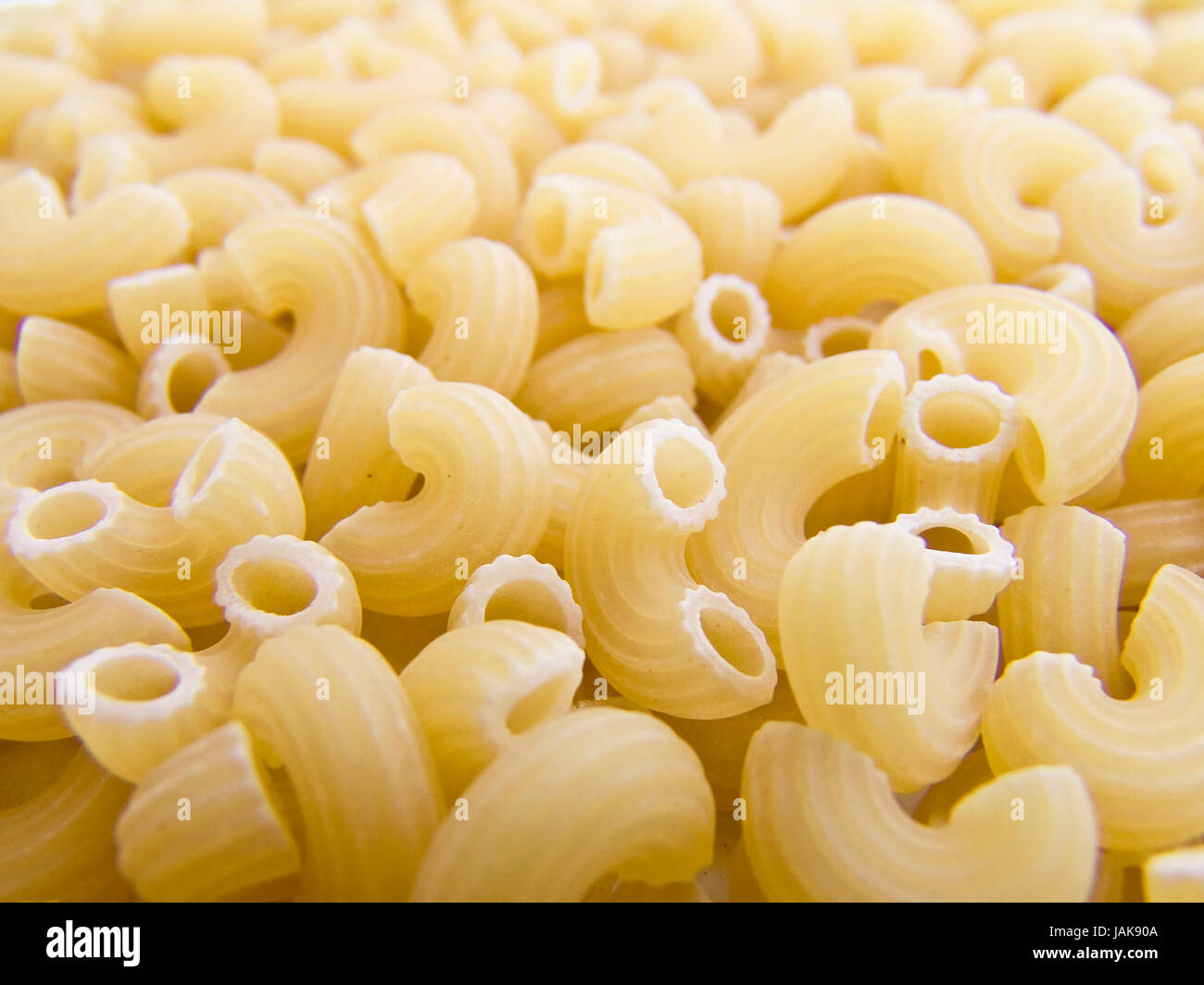 food background a pile of beautiful pasta small horns Stock Photo Alamy