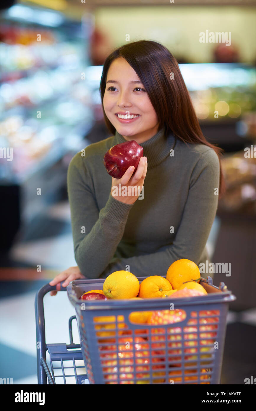 One Young Chinese Woman Shopping in the Supermarket Stock Photo Alamy