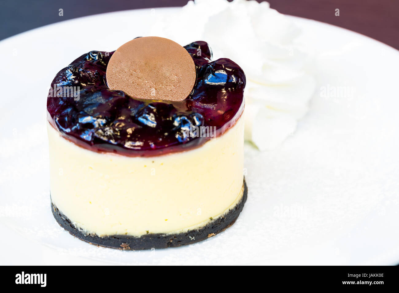 blueberry cheesecake with whipping cream Stock Photo Alamy
