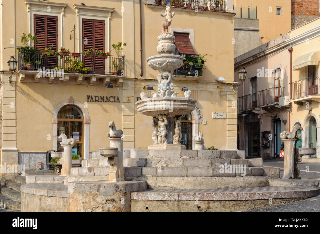 This Baroque style fountain made of marble in Piazza Duomo is the emblem of Taormina Stock Photo