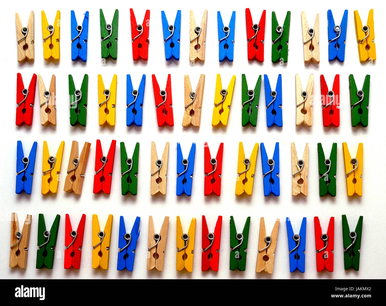 small clothes pegs of colors Stock Photo