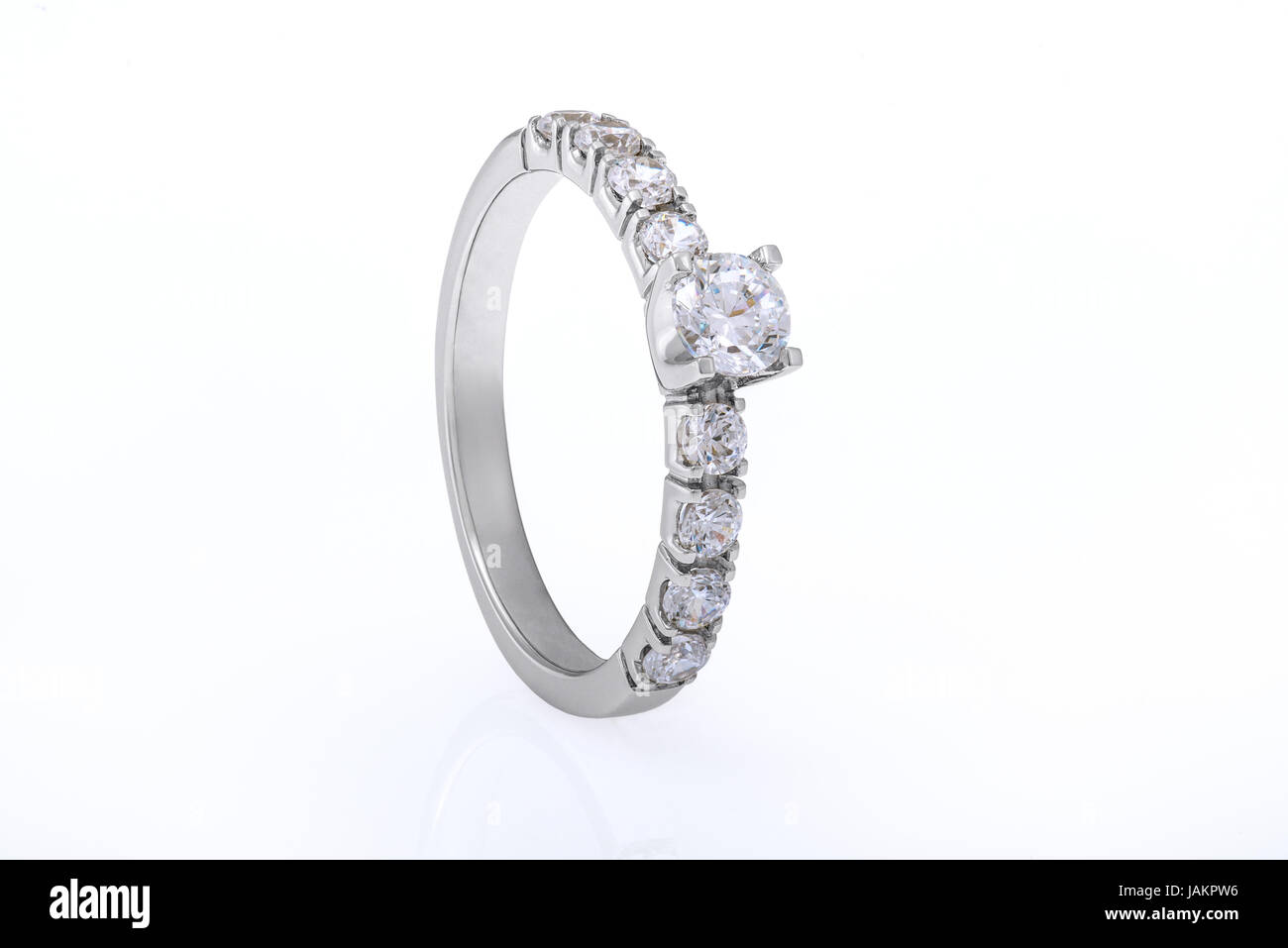 White Gold Wedding, Engagement Ring Jewellery with Diamonds on White Background Stock Photo
